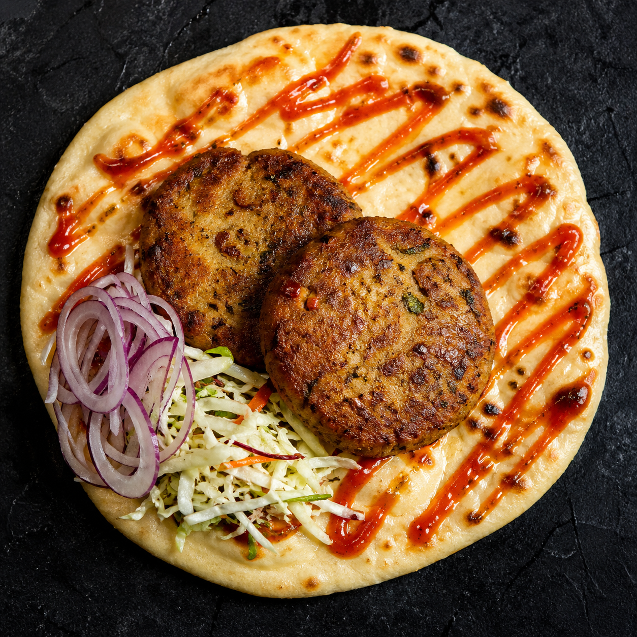 Naan served with kebab and sauce